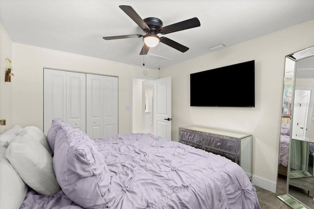 129 Rogers Pl, Port Orange, FL 32127 - bedroom featuring a closet, attic access, and ceiling fan
