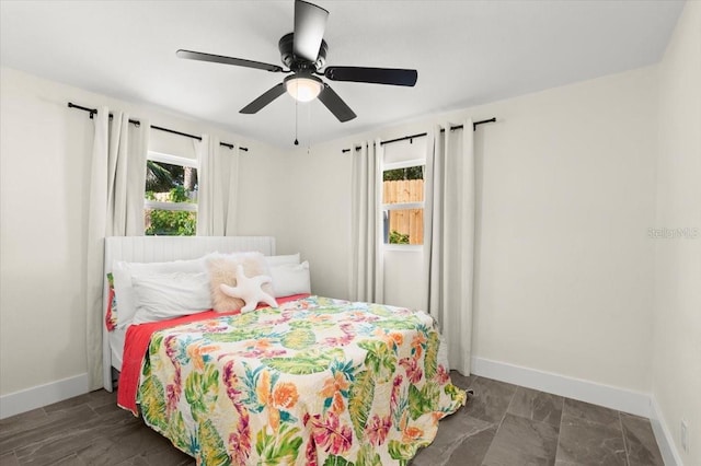 129 Rogers Pl, Port Orange, FL 32127 - bedroom with multiple windows and ceiling fan