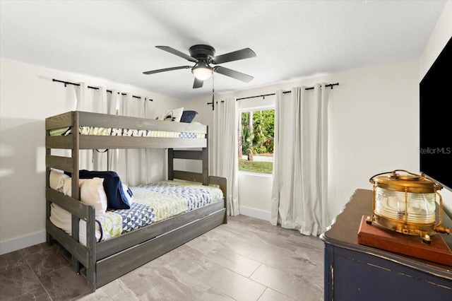 129 Rogers Pl, Port Orange, FL 32127 - bedroom with marble look tile flooring and a ceiling fan