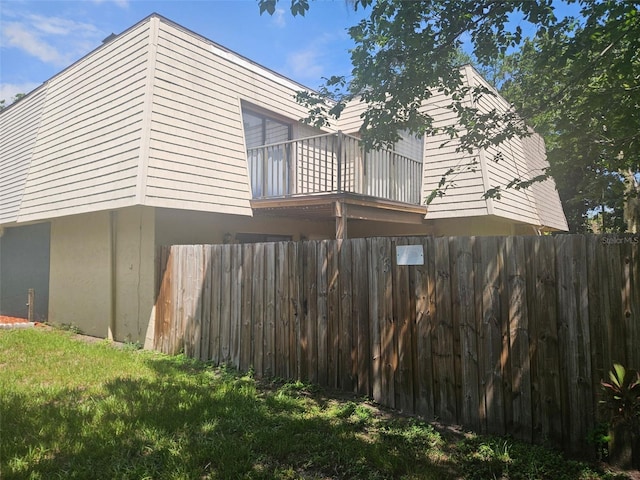 93 Springwood Sq, Port Orange, FL 32129 - view of home's exterior featuring a balcony