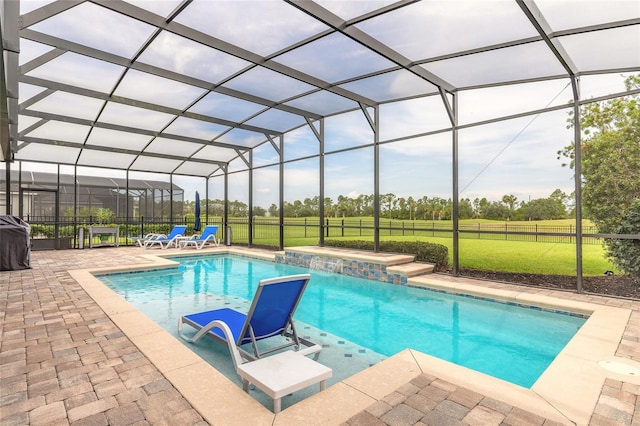 2931 Bella Flore Ter, New Smyrna Beach, FL 32168 - swimming pool with a patio area, a yard, a lanai, and grilling area