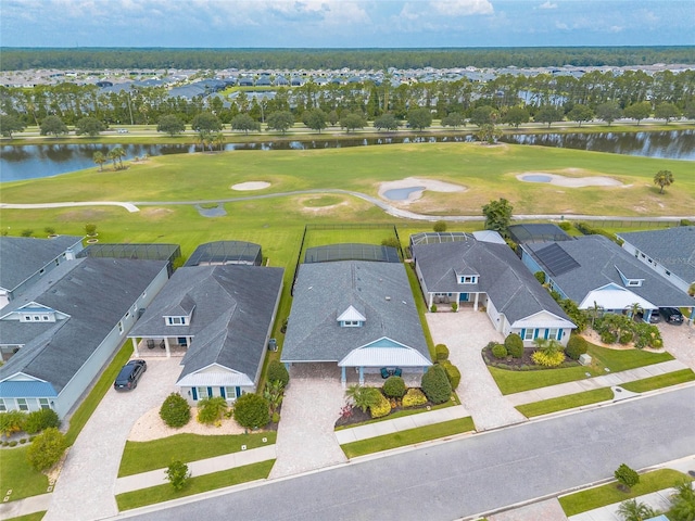 2931 Bella Flore Ter, New Smyrna Beach, FL 32168 - aerial view of residential area with a local golf course and a large body of water