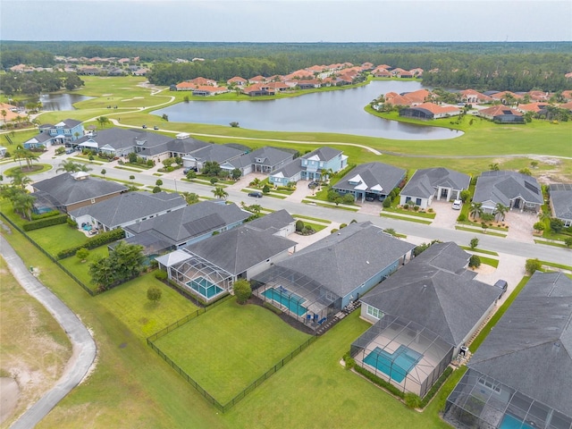 2931 Bella Flore Ter, New Smyrna Beach, FL 32168 - aerial view of residential area with a nearby body of water and a golf club