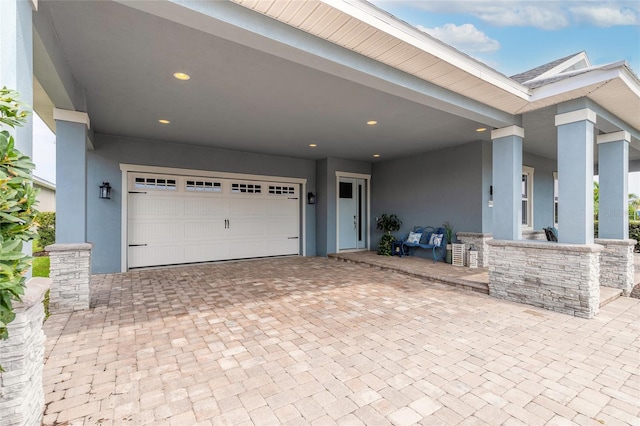 2931 Bella Flore Ter, New Smyrna Beach, FL 32168 - view of front of home featuring stucco siding and decorative driveway