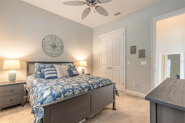 2931 Bella Flore Ter, New Smyrna Beach, FL 32168 - bedroom featuring light carpet, a closet, and a ceiling fan