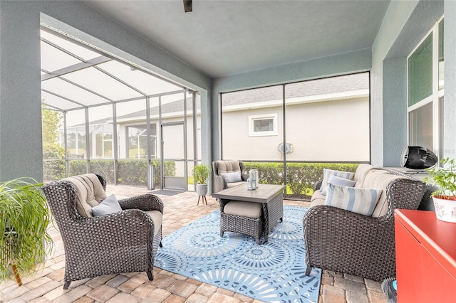2931 Bella Flore Ter, New Smyrna Beach, FL 32168 - sunroom featuring healthy amount of natural light and an outdoor hangout area