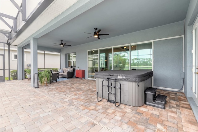 2931 Bella Flore Ter, New Smyrna Beach, FL 32168 - view of patio with a hot tub, outdoor lounge area, and a ceiling fan