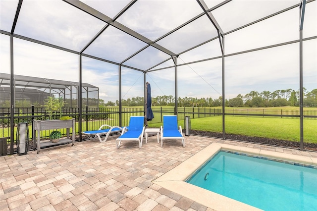 2931 Bella Flore Ter, New Smyrna Beach, FL 32168 - view of swimming pool featuring a patio and glass enclosure