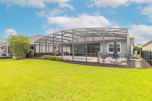2931 Bella Flore Ter, New Smyrna Beach, FL 32168 - back of property with a patio area and a lanai