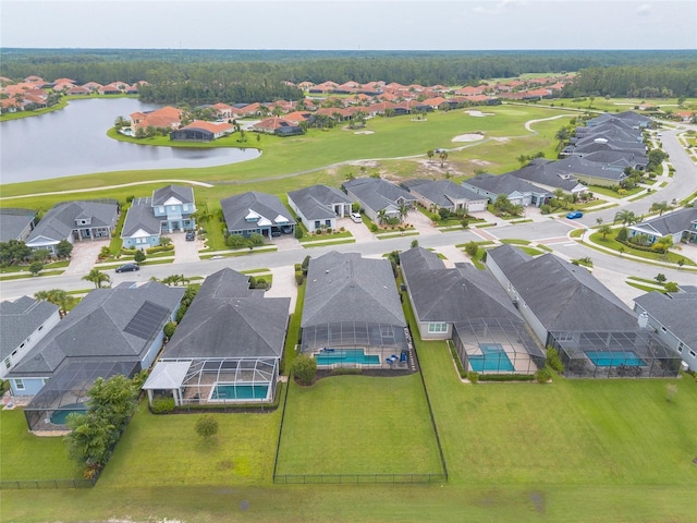 2931 Bella Flore Ter, New Smyrna Beach, FL 32168 - aerial perspective of suburban area featuring a golf club and a large body of water