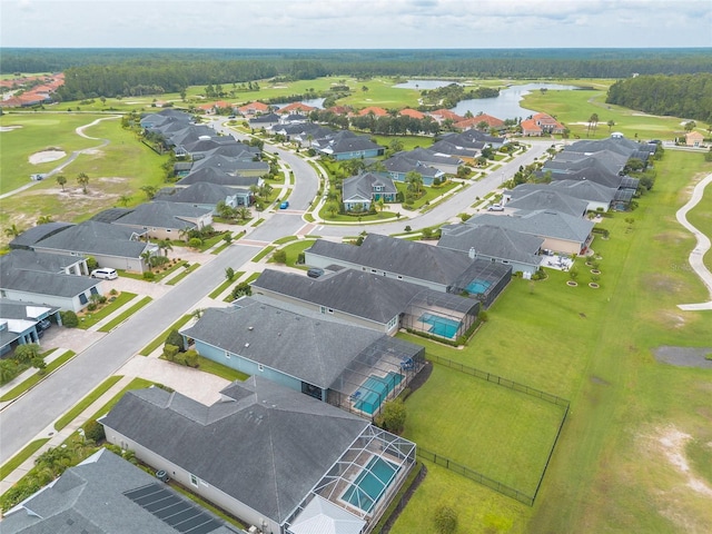 2931 Bella Flore Ter, New Smyrna Beach, FL 32168 - aerial perspective of suburban area with a large body of water and a golf course