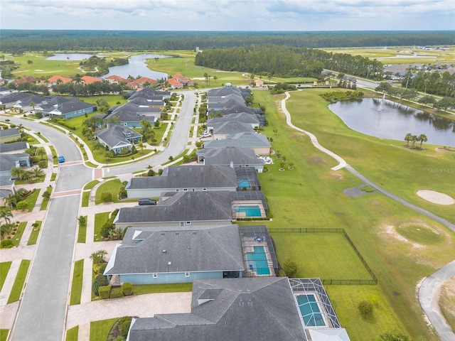 2931 Bella Flore Ter, New Smyrna Beach, FL 32168 - aerial view of residential area with a nearby body of water and a local golf course