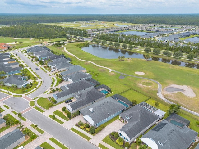 2931 Bella Flore Ter, New Smyrna Beach, FL 32168 - aerial view of property's location with a nearby body of water, a golf course, and nearby suburban area