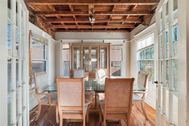 sunroom / solarium featuring french doors, wood ceiling, and beamed ceiling