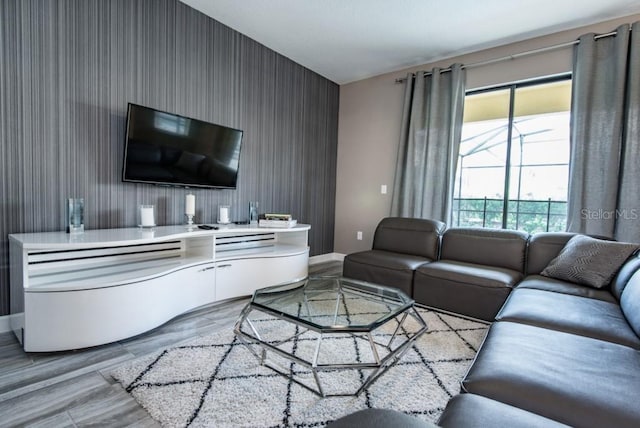 living room with light hardwood / wood-style flooring