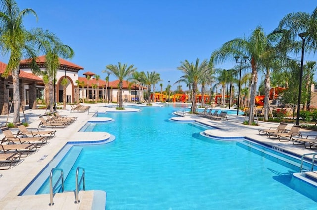 view of pool featuring a patio area