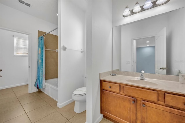 full bathroom featuring toilet, vanity, shower / bathtub combination with curtain, and tile patterned flooring