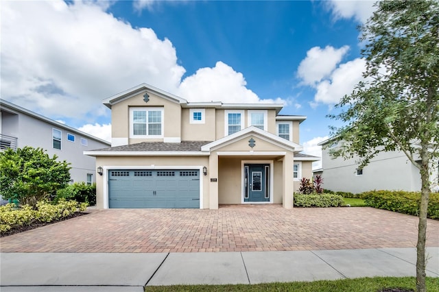 view of front of property with a garage