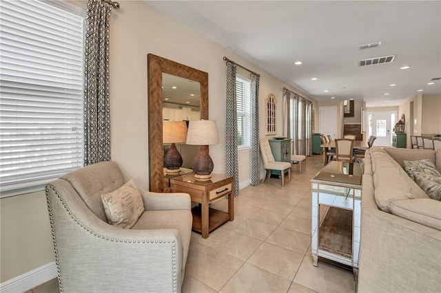 living room with light tile floors