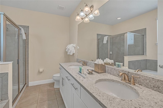 full bathroom featuring a chandelier, toilet, dual vanity, shower with separate bathtub, and tile flooring