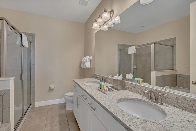 full bathroom featuring dual sinks, oversized vanity, toilet, independent shower and bath, and tile floors