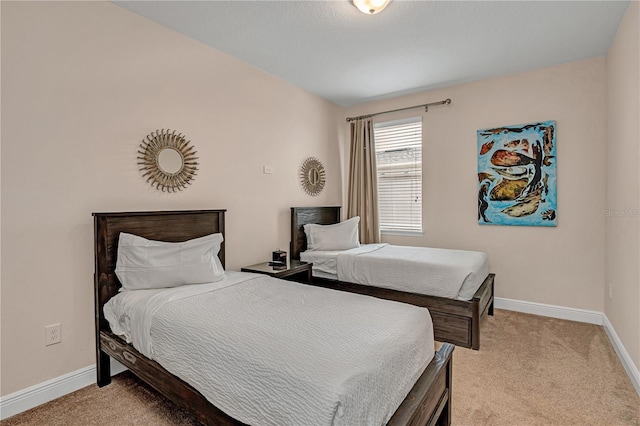 bedroom featuring light colored carpet