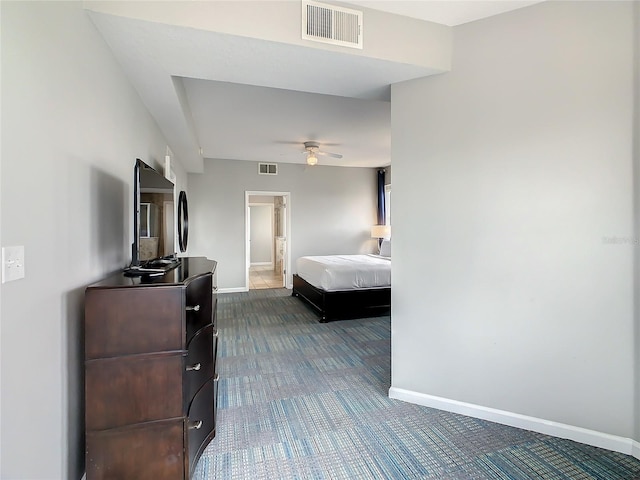 bedroom featuring ceiling fan and dark colored carpet