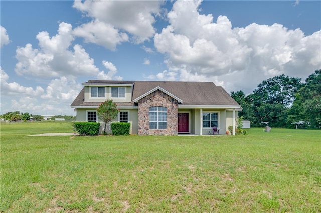 view of front of property with a front lawn