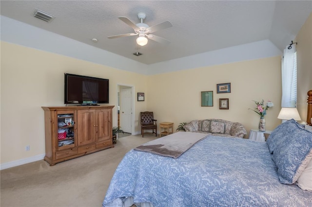 bedroom with light colored carpet and ceiling fan