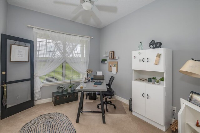 office featuring light colored carpet and ceiling fan