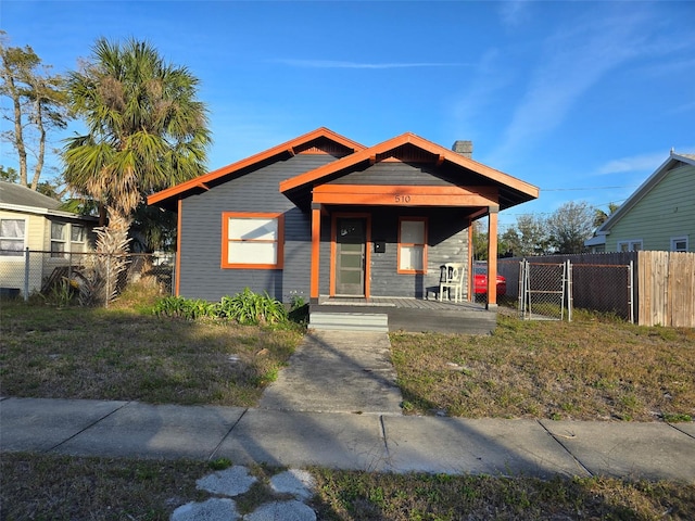 bungalow-style house featuring covered porch