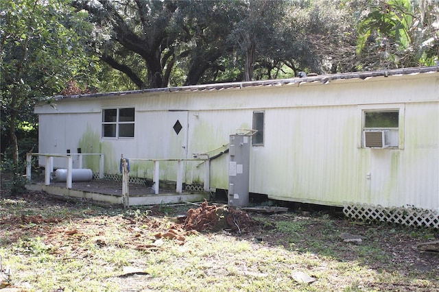 back of property with cooling unit