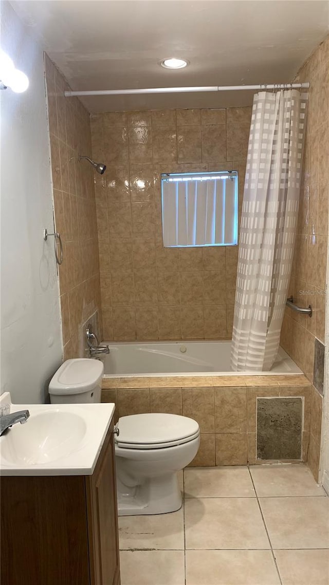 1023 W Gore St W, Orlando, FL 32805 - full bath featuring tiled shower / bath, tile patterned flooring, and vanity