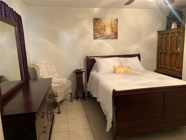 bedroom with light tile patterned floors and ceiling fan