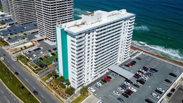 bird's eye view with a view of the beach and a water view