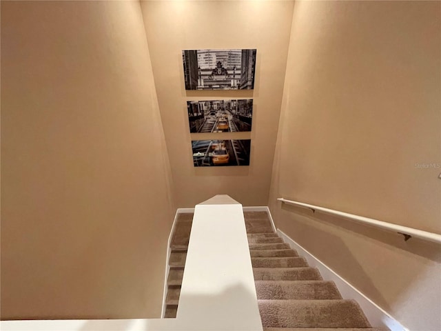 staircase with baseboards