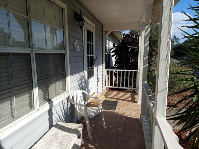 balcony featuring a porch