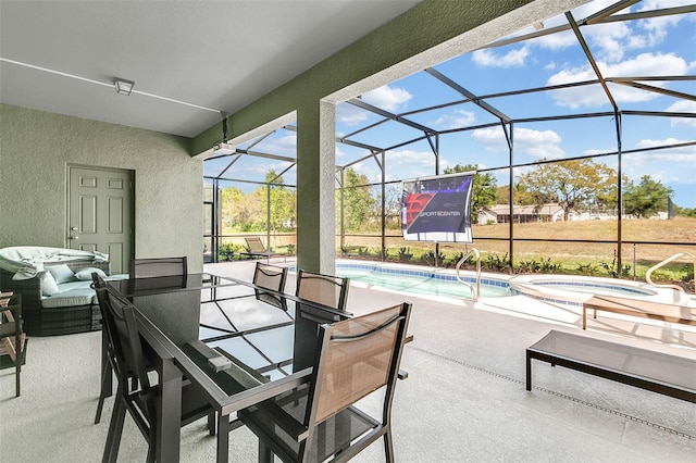 view of patio with a pool with hot tub and glass enclosure