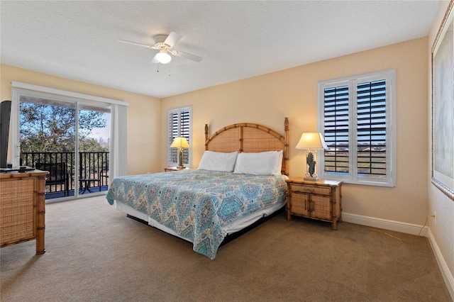 carpeted bedroom featuring ceiling fan, access to exterior, and a textured ceiling