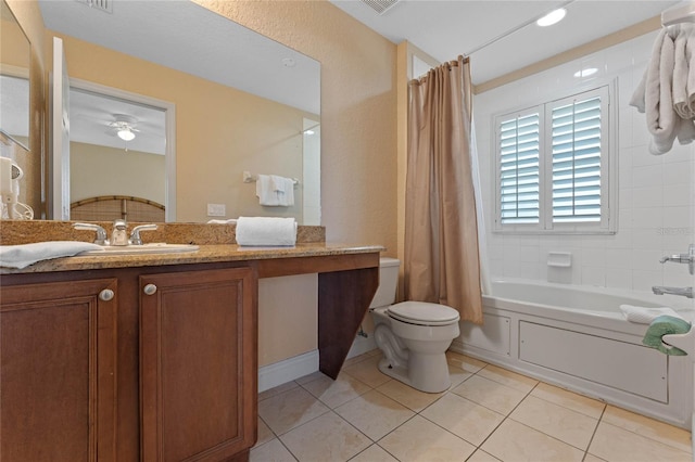 full bathroom featuring tile patterned flooring, vanity, shower / tub combo, and toilet