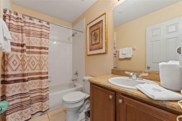 full bathroom featuring tile patterned floors, toilet, a textured ceiling, vanity, and shower / bath combination with curtain