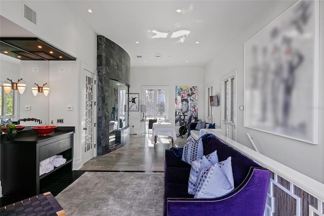 interior space with dark hardwood / wood-style floors, french doors, and a wealth of natural light