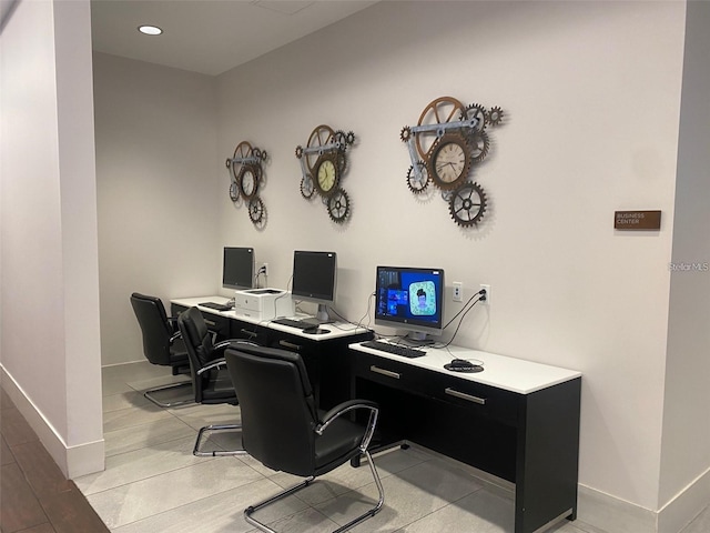 office with light hardwood / wood-style flooring