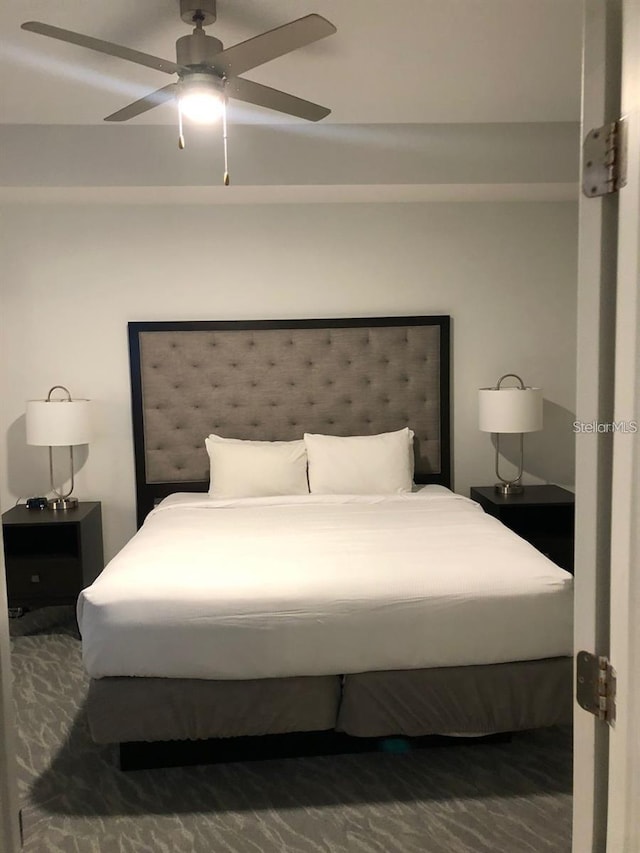 bedroom featuring carpet flooring and ceiling fan