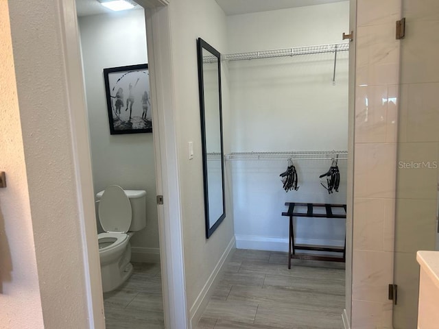 bathroom featuring toilet