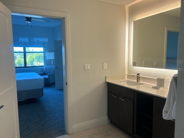 bathroom with vanity and ceiling fan