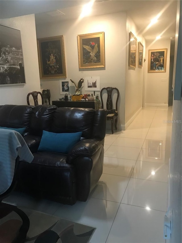 living room featuring tile patterned flooring