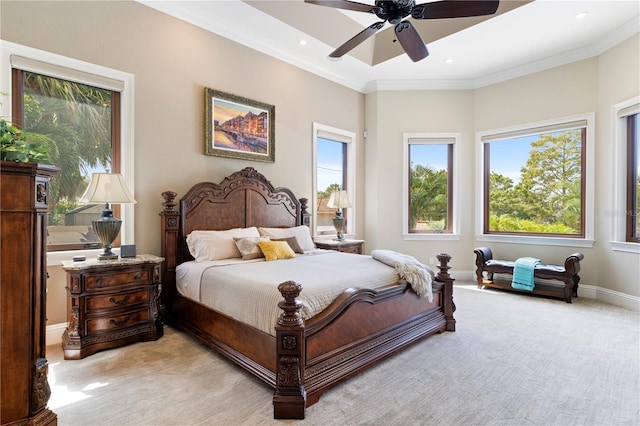 bedroom featuring light carpet, ornamental molding, and ceiling fan