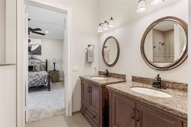 bathroom with crown molding, double vanity, ceiling fan, and tile flooring