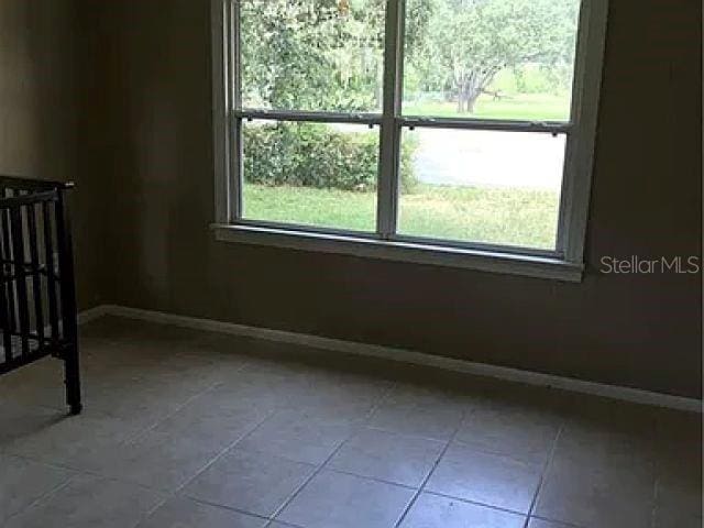 interior space with light tile floors